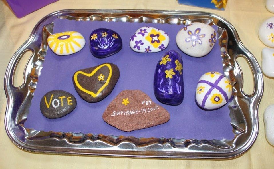 A selection of the 87 handpainted "Suffrage Stones" distributed in the community.